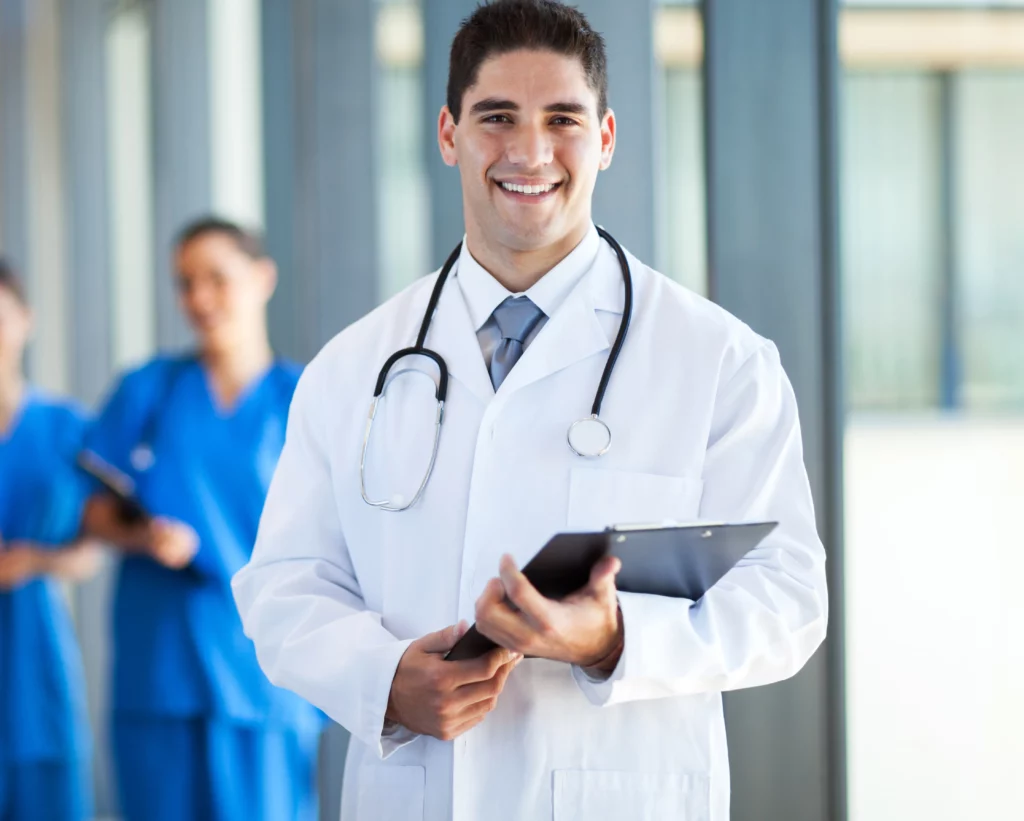Smiling Doctor in White Coat