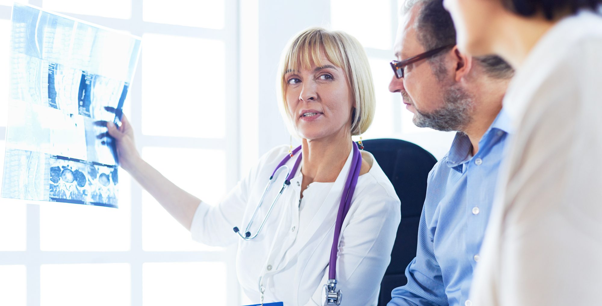 Doctor Woman Explaining Results to Patient